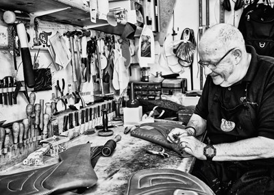 Lot 25 - Jayne Odell black and white photographic print, 'Making saddles', 160cm x 114cm