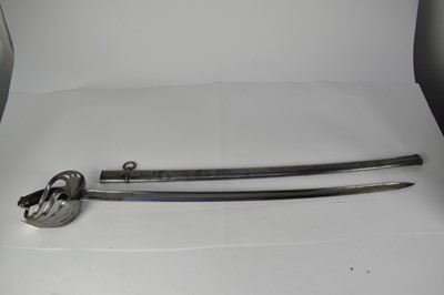 Lot 946 - Late 19th/early 20th century Chilean French made cavalry sword with Chilean Shield to ricasso , French manufactures inscription to back strap, curved fullered T back blade, pierced bowl guard, Bake...