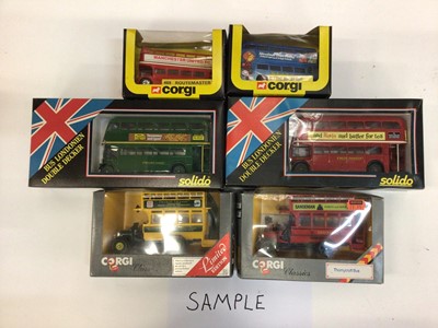 Lot 1949 - Boxed selection of Corgi and Solido buses and coaches (16)