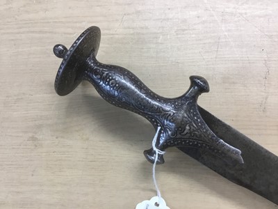 Lot 948 - 19th century Indian tulwar sword with silver damescened scroll decoration to hilt and curved blade 86 cm overall