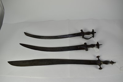 Lot 950 - 19th century Indian sword with gold damascene decoration to hilt, unusual yatagang trade blade with stamped crown and broard tip 78.5 cm overall ( pommel disc lacking) and two 19th century Indian s...