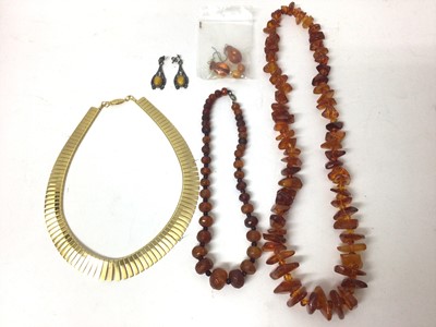 Lot 849 - Two amber necklaces, gold plated Cleopatra necklace and two pairs of amber earrings