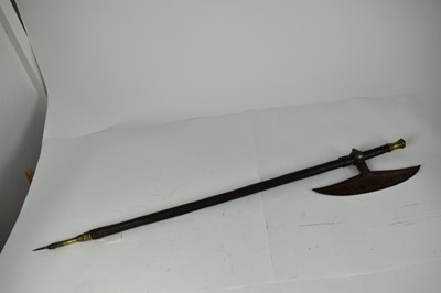Lot 956 - 19th century Northern Indian fighting axe with wooden shaft and brass mounts 98 cm