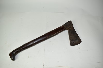 Lot 959 - 19th century possibly Native American trade axe with heavy axe head decorated with symbols and wriggle work on mahogany shaft 48 cm