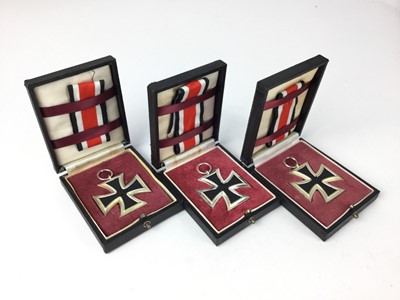 Lot 832 - Group of three Post War copies of Nazi Iron Cross Second Class, with boxes of issue. (3)