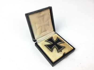 Lot 833 - Nazi Iron Cross First Class, the pin marked L10, in case.  
N.B. We believe the Iron Cross is possibly an early Post War copy, please satisify yourself as to its authenticity prior to bidding.