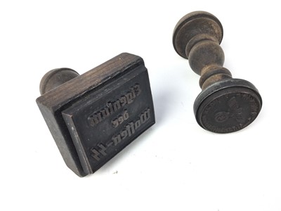 Lot 836 - Two Post War replica Nazi document stamps with turned wood handles (2)