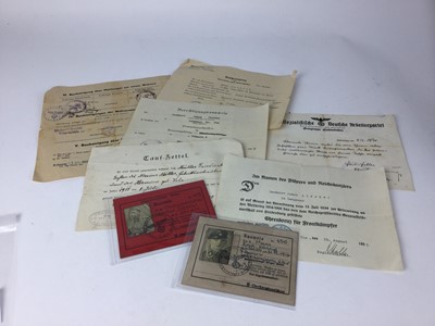 Lot 844 - Small group of Nazi documents including soliders identity papers, certificate and others.