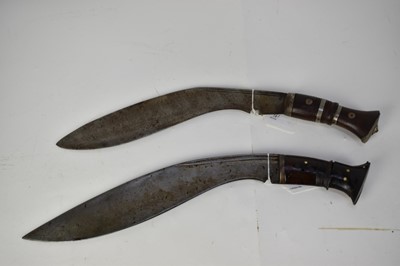 Lot 961 - 19th century Gurka Kukri with wood and horn hilt and early 20th century Gurka Kukri, sheaths lacking (2)