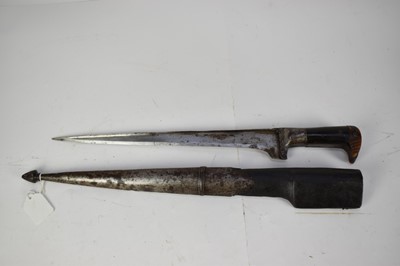 Lot 964 - 19th century Indo-Persian Kard dagger with horn and horn grips, T section tapering blade in steel mounted leather covered sheath 53 cm overall