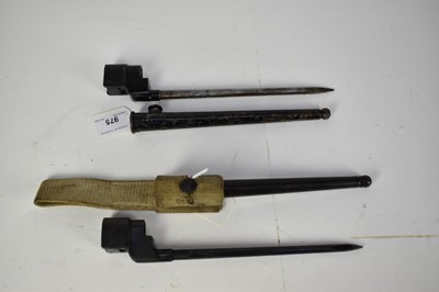 Lot 975 - Two Second World War British spike bayonets with scabbards (2)