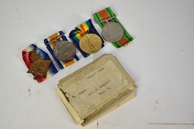 Lot 765 - First World War trio comprising 1914 - 15 Star, War and Victory medals named to 24401 SJT. S. Roberts. Ches. R. together with two boxes of issue and a Second World War Defence medal.