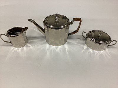 Lot 2560 - W.M.F. silver plated three piece teaset comprising teapot with wicker covered handle, together with matching milk jug and sugar bowl (3)