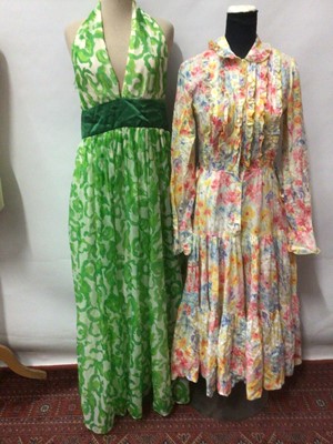 Lot 2141 - 1970's/80's dress including floral dress by Annie Cough, strapless pink polka dot evening by Radley, red strapless dress by Tom Bowker for Jean Varon,  printed green chiffon halter neck evening dre...