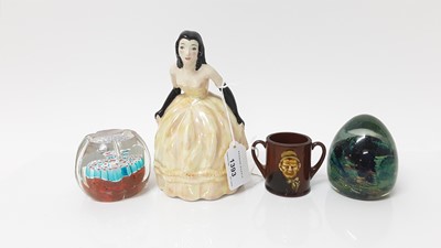 Lot 1393 - Maling figure, Royal Doulton two handled Dickens ware cup, Mdina paperweight and one other paperweight (4)