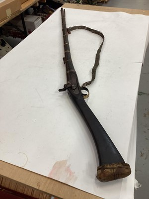 Lot 997 - 19th century Indian musket with Enfield lock dated 1878, V.R.I stamped stock with native decoration and alterations with decorative silver wire shoulder strap 142 cm