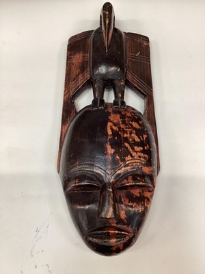 Lot 2602 - African carved wooden mask, together with a group of African textiles (1 box)