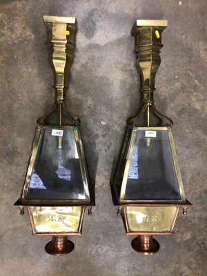Lot 2606 - Pair of large Victorian style brass electric lanterns, each marked VR, 88cm in overall height. (2)