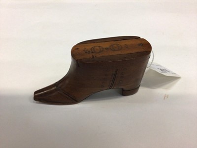 Lot 2615 - 19th century mahogany snuff box in the form of a shoe with inlaid brass pin decoration to lid, 9.8cm in length.