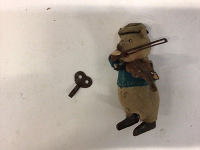 Lot 1993 - Schuco tinplate clockwork model of a pig playing violin.