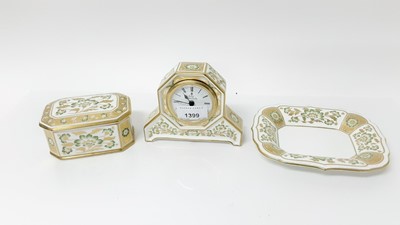 Lot 1399 - Royal Crown Derby Green Derby Panel porcelain clock, together with a trinket box with lid and a dish (3)