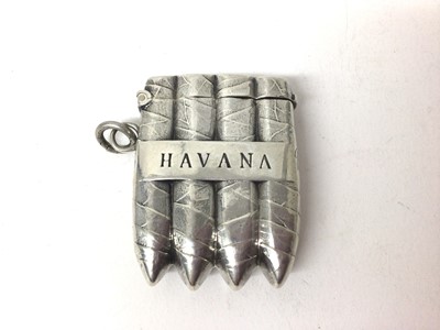 Lot 313 - Unusual Victorian novelty silver vesta case in the form of bound Havana cigars, (Birmingham 1891), maker William Neale, 3.5cm in diameter.  
Provenance: from the Finnikin vesta case collection.