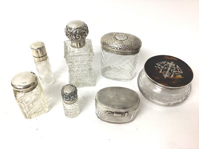 Lot 324 - Victorian silver topped cut glass scent bottle (London 1893), together with a Victorian silver topped cut glass travelling inkwell (London 1885) and other silver topped scent bottles and vanity jar...