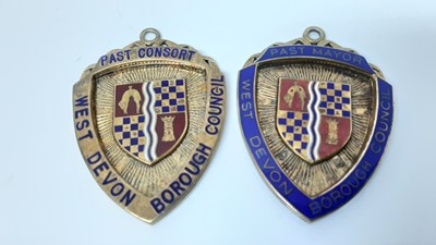 Lot 2657 - Elizabeth II silver and enamel Mayor or Past Mayors badge together with a Past Consort's badge both for West Devon Borough Council engraved to reverses 'Mrs. C. Grills. 2000 / 2001 and Mr Norman Gr...