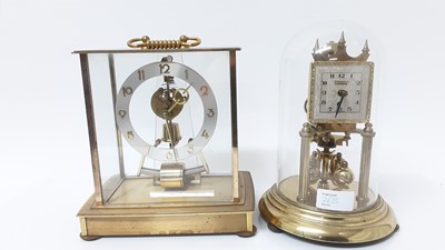 Lot 2625 - Vintage Kieninger & Obergfell Kudo Electronic skeleton clock, together with a Violeta anniversary clock (2)