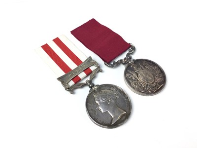 Lot 757 - Victorian medal pair comprising Indian Mutiny medal with one clasp- Delhi named to Chas. Smith 1st Bn. 60th Regt. and a Victorian Army Long Service and Good Conduct medal named to 3097 Sergt. C. F....