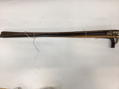 Lot 2630 - Edwardian gold mounted walking stick and four other silver mounted walking sticks (5)