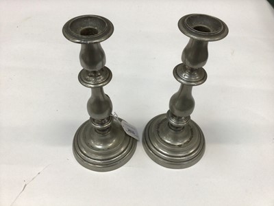 Lot 2633 - Pair of 19th century pewter push-up candlesticks