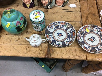 Lot 32 - 19th century Chinese famille rose teapot with figures and calligraphy, two 18th century Japanese dishes, a Canton enamel box and a Wang Binrong style ginger jar and cover