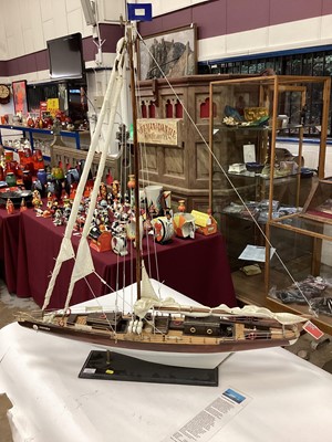 Lot 2683 - Good quality scratch built model of the sailing yacht Endeavour, a well known Americas Cup racing yacht, together with card containing information about the yacht, approximately 100cm in length.