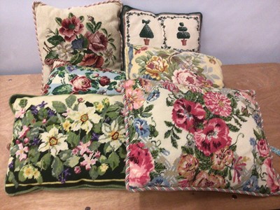 Lot 2147 - A quantity of contemporary hand stitched and other needle-point tapestry cushions in floral designs.