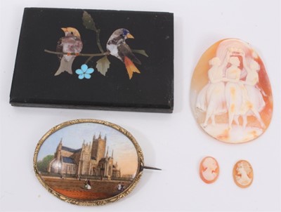 Lot 356 - Pietra dura panel, painted porcelain oval brooch, carved shell cameo depicting the Three Graces and two miniature cameos