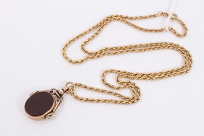 Lot 371 - 9ct gold rope twist chain with 9ct gold mounted hard stone rotating fob