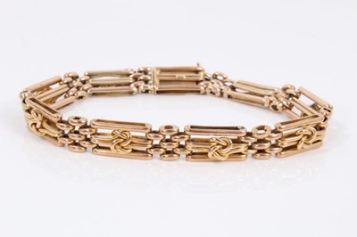 Lot 372 - Victorian yellow metal bracelet with knot decoration