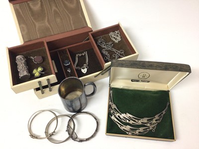Lot 379 - Scottish silver abstract bird necklace, silver bamboo bangle, two other silver bangles, silver chains, other jewellery and a small silver tankard