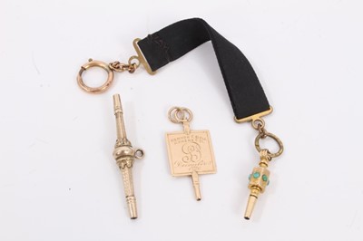 Lot 386 - Georgian yellow metal watch winding key with presentation engraving and two Victorian winding keys