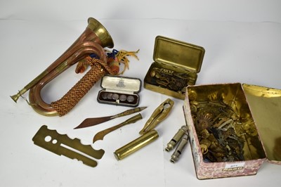 Lot 871 - First World War Princess Mary Christmas Gift tin, together with a group of silver buttons in fitted case, military cap badges, bugle and trench art paper knives.