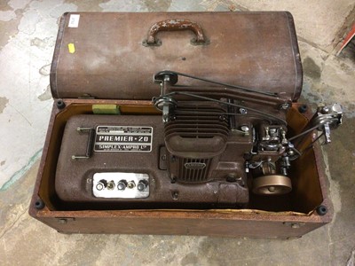 Lot 2722 - Vintage Ampro film projector and film (two cases)