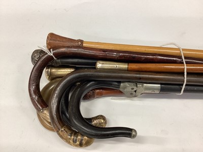 Lot 2665 - Group of eleven Victorian and later silver mounted walking sticks (11)