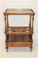 Lot 1174 - Victorian figured walnut Canterbury whatnot...