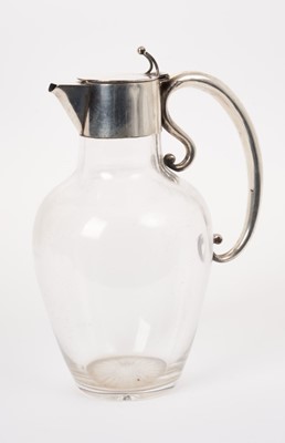 Lot 203 - Edwardian silver mounted glass claret jug