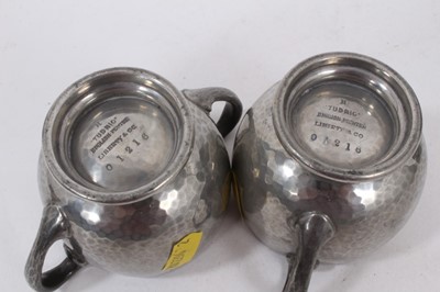 Lot 705 - Tudric pewter teapot and ensuite cream jug, by Archibald Knox, other pewter