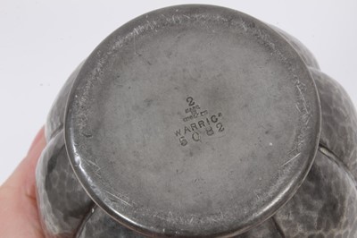 Lot 705 - Tudric pewter teapot and ensuite cream jug, by Archibald Knox, other pewter