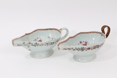 Lot 64 - Pair of 18th century Chinese export porcelain sauce boats (both damaged / restored)