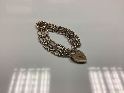 Lot 65 - 9ct gold gate bracelet with padlock clasp