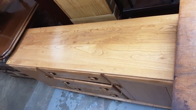 Lot 1065 - Good quality Blonde Ercol Windsor 455 sideboard with three central drawers flanked by cupboards, 154.5cm wide, 43cm deep, 68cm high